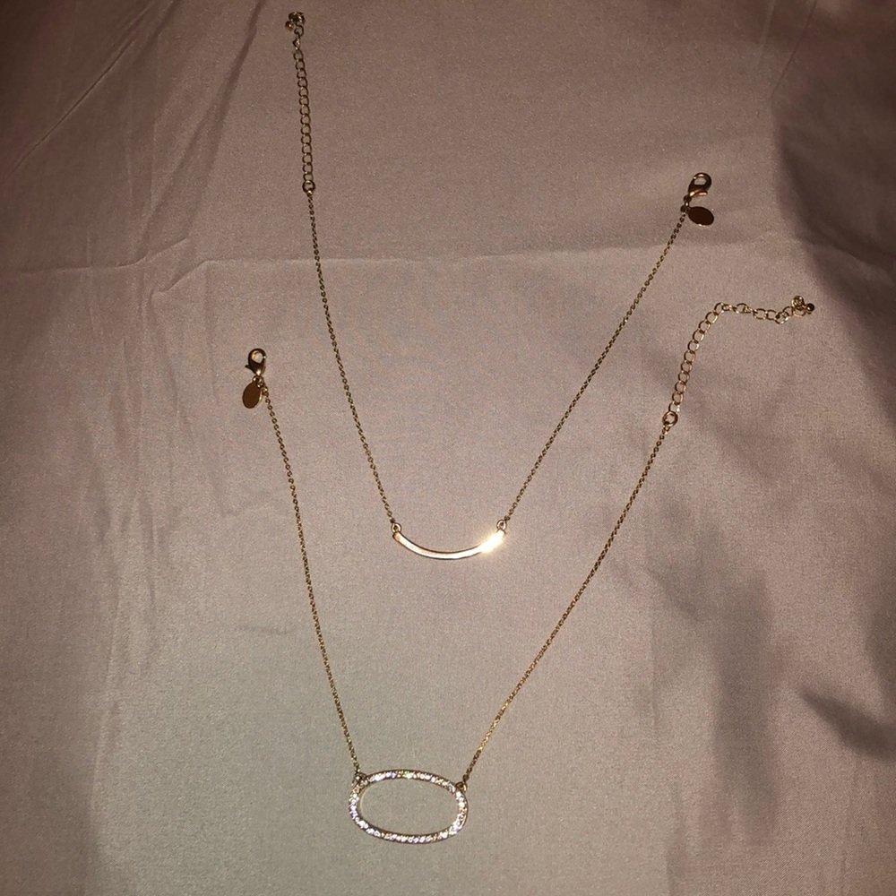 2 choker length necklaces, both gold